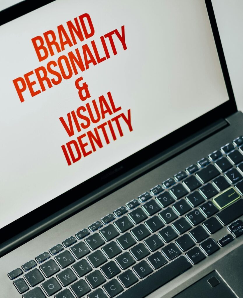 Laptop screen showing text on brand personality and visual identity for marketing strategy.